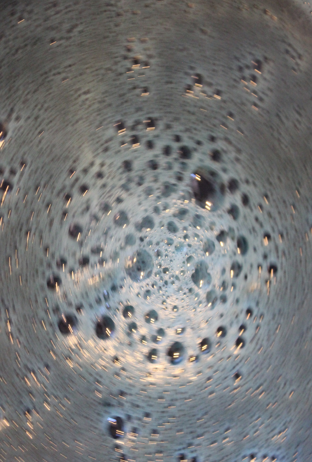 stirring red cabbage liquid